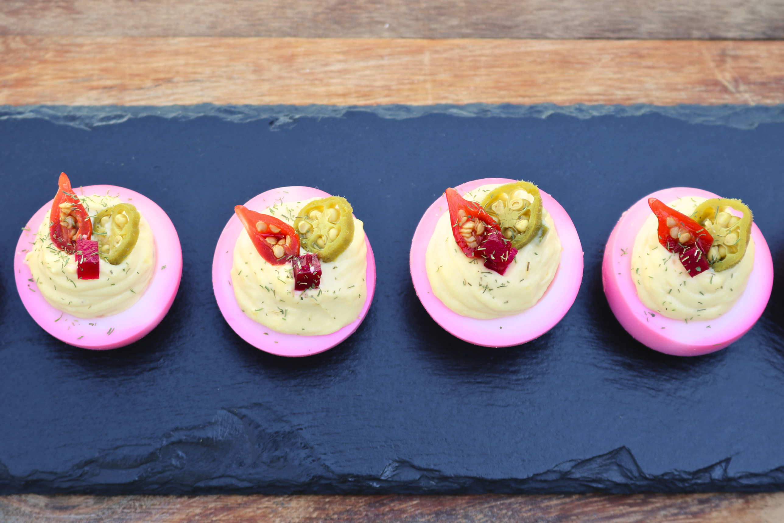 HL Catering small bites arranged in the airy food photography style of the current site